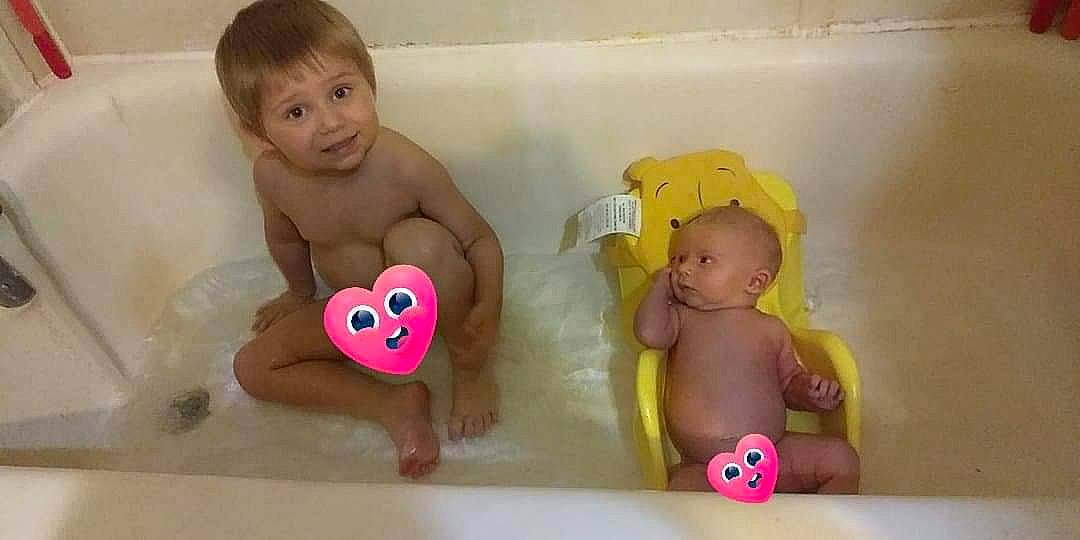 Grayson joined the competition — help win amazing prizes! baby, baby_bathing, baby_products, baby_toys, bath_toy, bathing, bathtub, child, fun, person, pink, play, product, stomach, toddler, toy