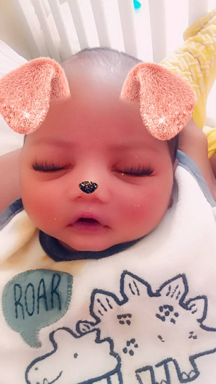 Braedyn is registered to the contest to win money with this photo: baby, cheek, child, ear, head, person, pink, skin, snout, stuffed_toy, textile, toy