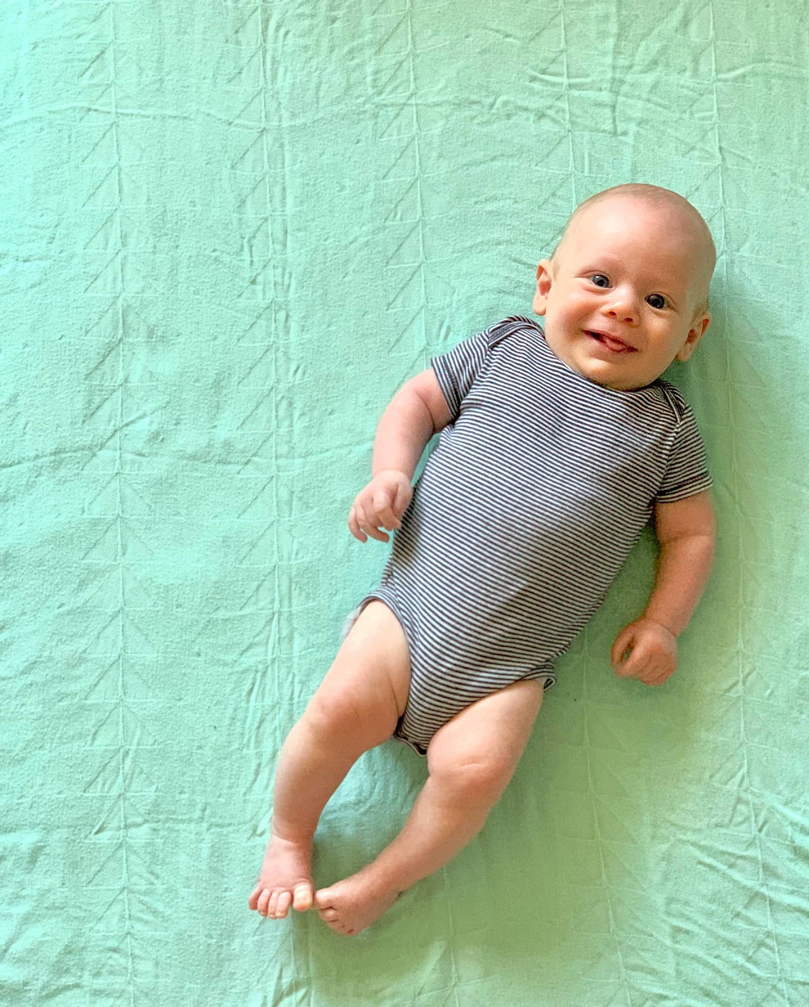 Jon joined the competition — help win amazing prizes! baby, baby_toddler_clothing, barefoot, child, fun, green, joy, leg, person, product, skin, smile, toddler