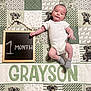 baby, infant, one_month, onesie, blanket, quilt, milestone_chalkboard, chalkboard, name_banner, grayson, puppy_pattern, dog_print, socks, garland_beads, laying_down, smile, portrait, indoor, cute, newborn