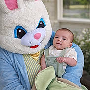 Grayson joined the competition — help win amazing prizes! baby, bunny_costume, blanket, blue_eyes, child, cute, face, fur, giraffe_design, green_blanket, indoor, person, plush, portrait, pink_ears, smile, soft_texture, toy_costume, window, young_child