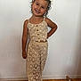 Deynah a rejoint le concours — aidez-le/la à gagner de superbes lots ! child, girl, smiling, posing, lace, outfit, hair_bows, curly_hair, earrings, necklace, standing, wood_floor, wall, indoor, fashion, happy, cute, portrait, person, clothing