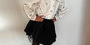 Deynah a rejoint le concours — aidez-le/la à gagner de superbes lots ! child, girl, smile, posing, white_blouse, black_skirt, black_bows, curly_hair, heart_tights, black_shoes, wooden_floor, indoor, wall, fashion, cute, standing, happy, portrait, hands_on_hips, earrings