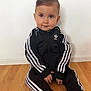 Lawson a rejoint le concours — aidez-le/la à gagner de superbes lots ! toddler, child, sitting, floor, wooden_floor, tracksuit, adidas, black_clothing, white_stripes, indoor, portrait, young_child, cute, curious, smiling, person, fashion, casual_wear, head, face