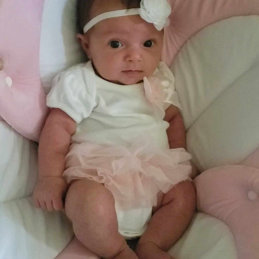 Onica is registered to the contest to win money with this photo: baby, bed, bedroom, couch, crib, cushion, diaper, face, furniture, head, homedecor, indoors, infantbed, newborn, person, photography, pillow, portrait, room, sleeping