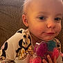 Caroline Cottrill joined the competition — help win amazing prizes! accessories, baby, bodypart, candy, couch, cushion, face, finger, food, furniture, hand, head, homedecor, newborn, person, photography, portrait, sitting, sweets, toy