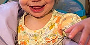 Caroline Cottrill joined the competition — help win amazing prizes! baby, babylaughing, bodypart, clothing, couch, dress, face, finger, hand, happy, head, laughing, mouth, person, photography, portrait, sitting, smile, t_shirt, teeth