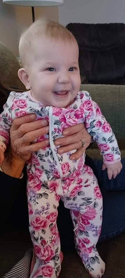 Liberty joined the competition — help win amazing prizes! arm, baby_toddler_clothing, cheek, ear, eye, face, facial_expression, gesture, hand, happy, head, joy, lip, nose, outerwear, person, pink, skin, sleeve, smile