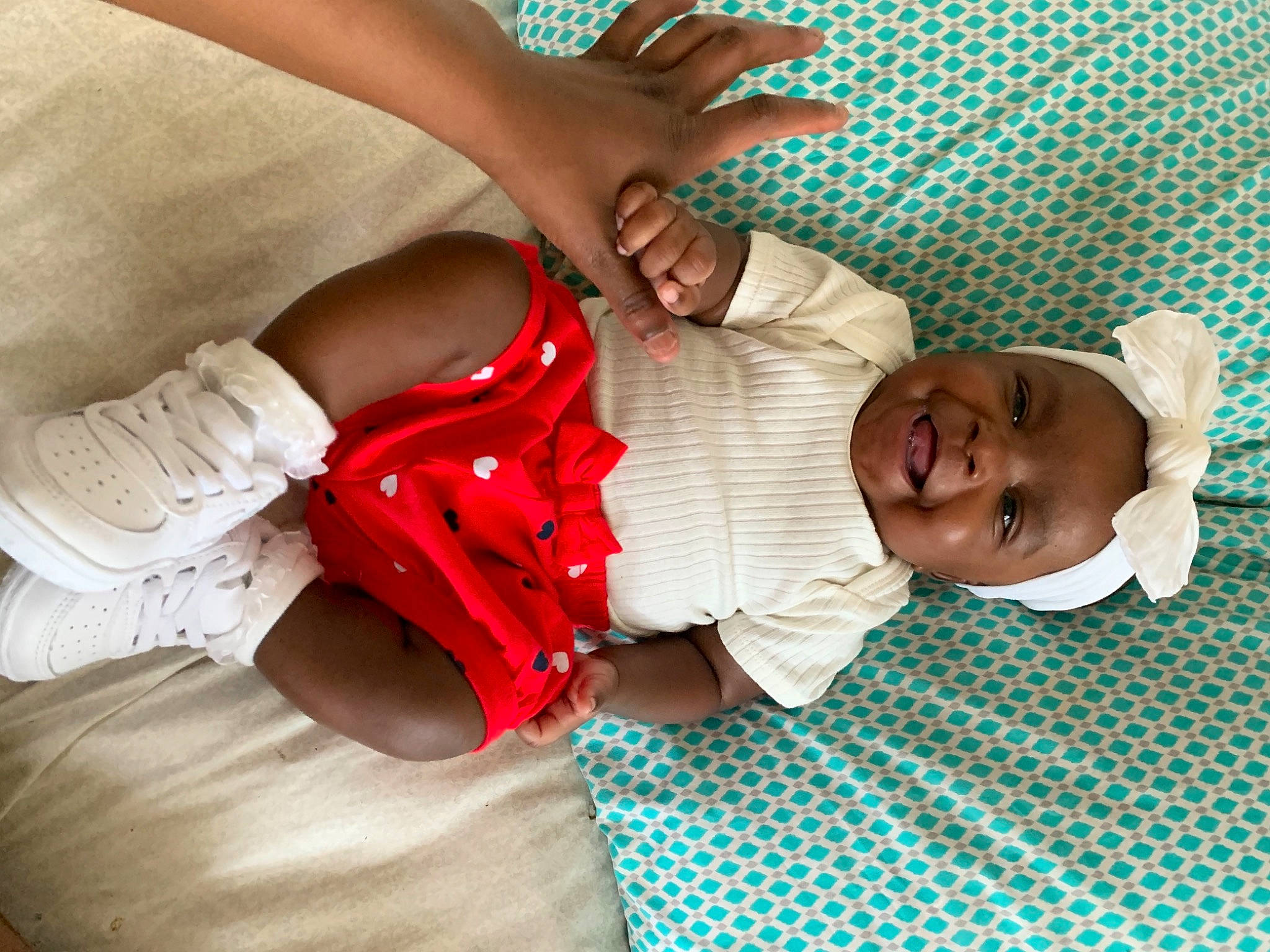 Kaiya joined the competition — help win amazing prizes! baby, baby_toddler_clothing, child, comfort, elbow, finger, gesture, hand, happy, human_body, joint, knee, leg, linens, mouth, person, skin, thigh, toddler, trunk