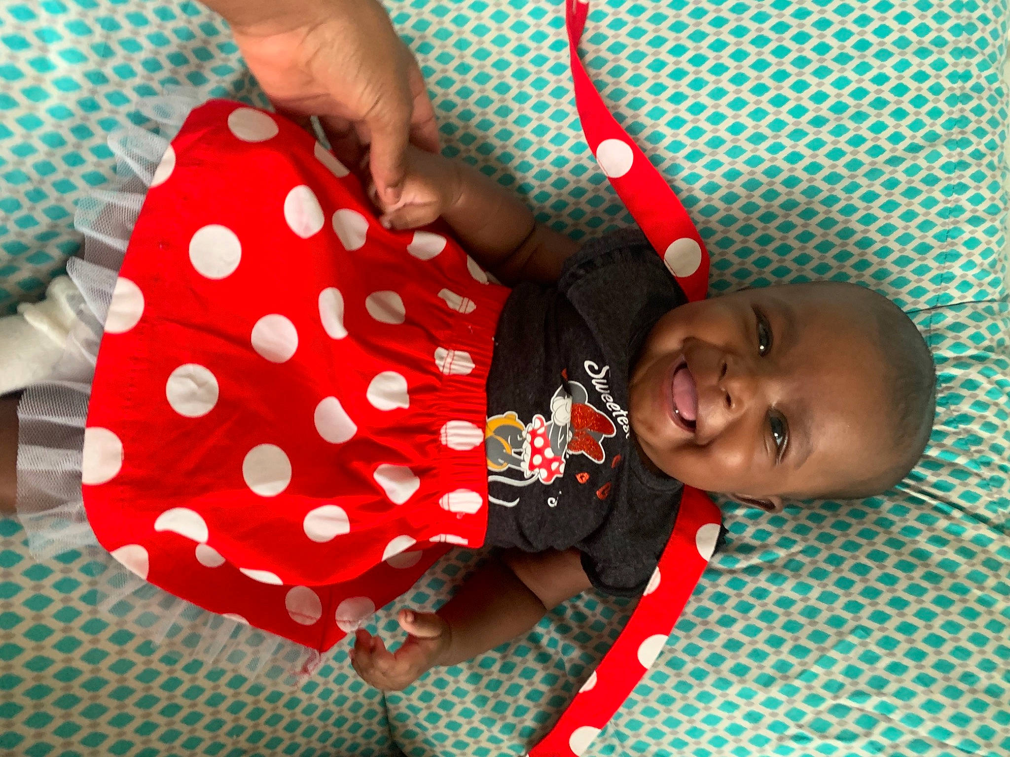 Kaiya joined the competition — help win amazing prizes! baby, baby_products, baby_toddler_clothing, carmine, child, comfort, elbow, fashion_accessory, fun, happy, joy, leisure, magenta, pattern, person, petal, product, sleeve, smile, thigh