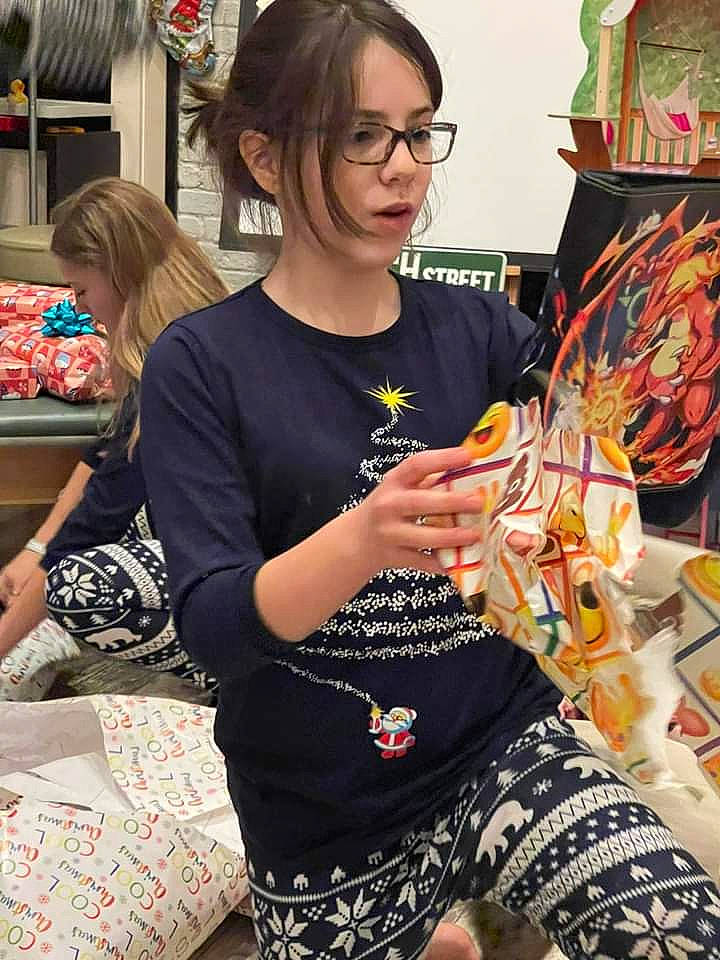 Olivia is registered to the contest to win money with this photo: art, artist, event, eyewear, fashion_accessory, fashion_design, fun, glasses, hand, human_leg, jewellery, necklace, pattern, person, sleeve, t_shirt, tattoo, textile, thigh, vision_care