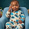 baby, child, infant, portrait, smiling, sitting, armchair, pajamas, cookie_monster, blue, toy, nursery, indoors, face, hands, short_hair, happy, cute, photography, playful