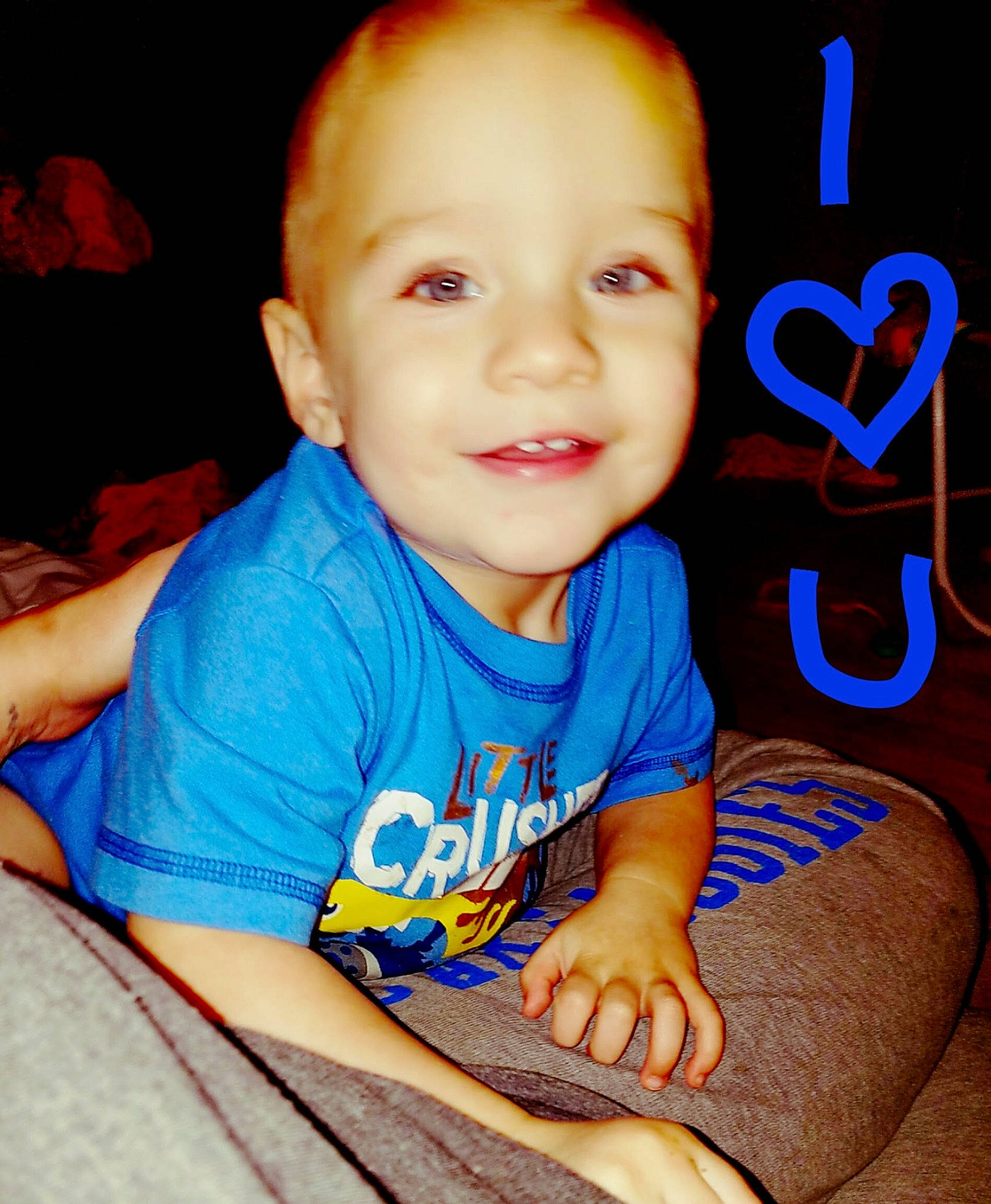 Luke joined the competition — help win amazing prizes! baby, blue, cheek, child, chin, cool, eye, face, facial_expression, forehead, fun, head, lip, nose, organ, person, sitting, skin, smile, toddler