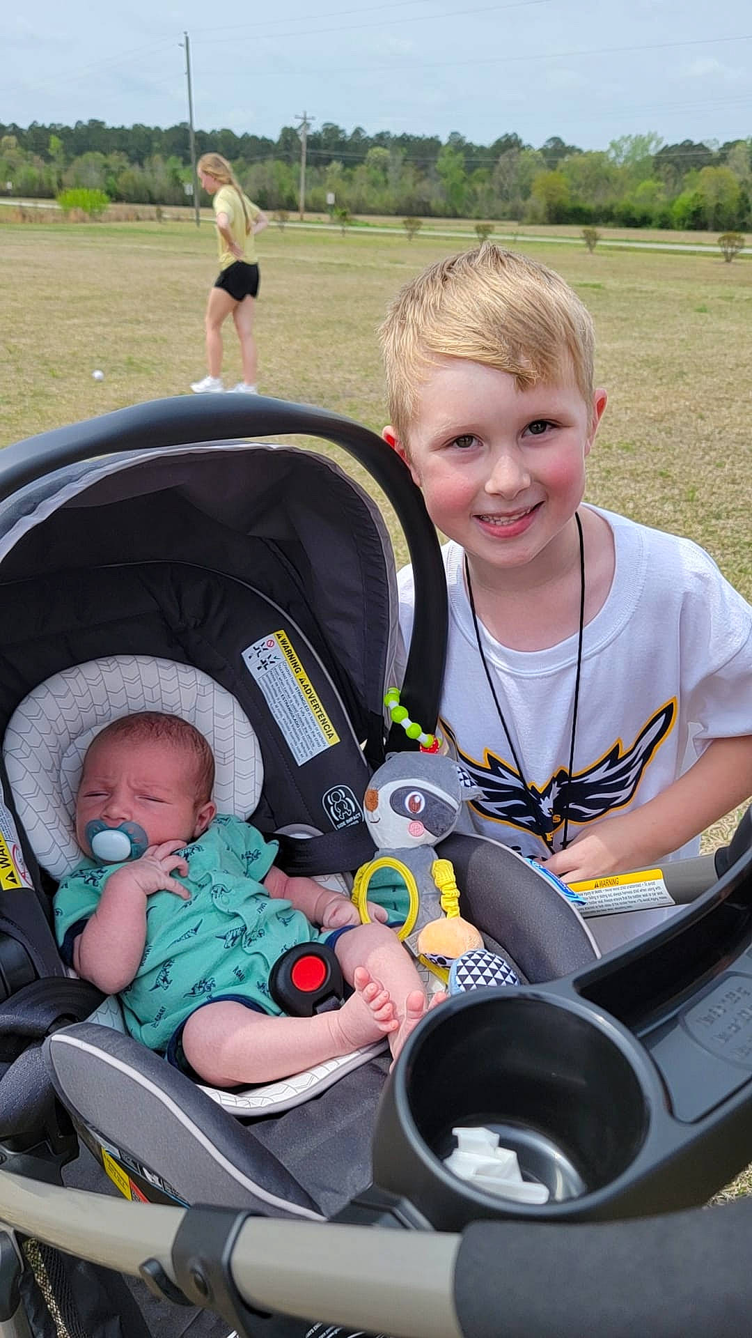 Jaxton joined the competition — help win amazing prizes! automotive_tire, baby, baby_carriage, baby_products, baby_toddler_clothing, child, comfort, fun, grass, green, happy, joy, leisure, person, plant, product, recreation, sitting, sky, smile