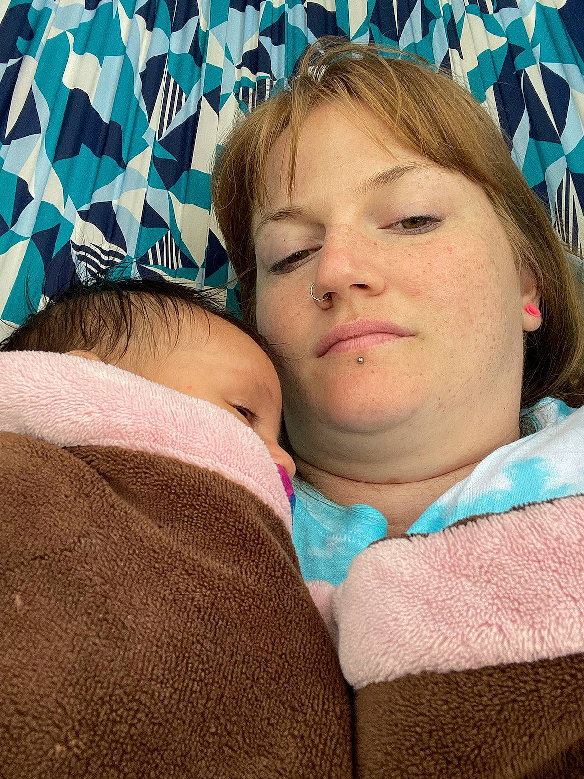 Amber is registered to the contest to win money with this photo: beauty, blond, blue, cheek, child, chin, close_up, comfort, cool, eyebrow, eyelash, facial_expression, fun, happy, human, linens, organ, pattern, person, skin