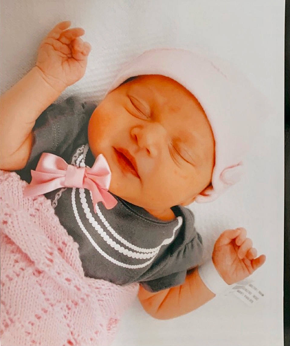 Sophia is registered to the contest to win money with this photo: baby, baby_products, baby_safety, baby_sleeping, baby_toddler_clothing, cheek, child, comfort, ear, eyelash, gesture, headwear, linens, lip, nail, neck, nose, person, skin, sleeve