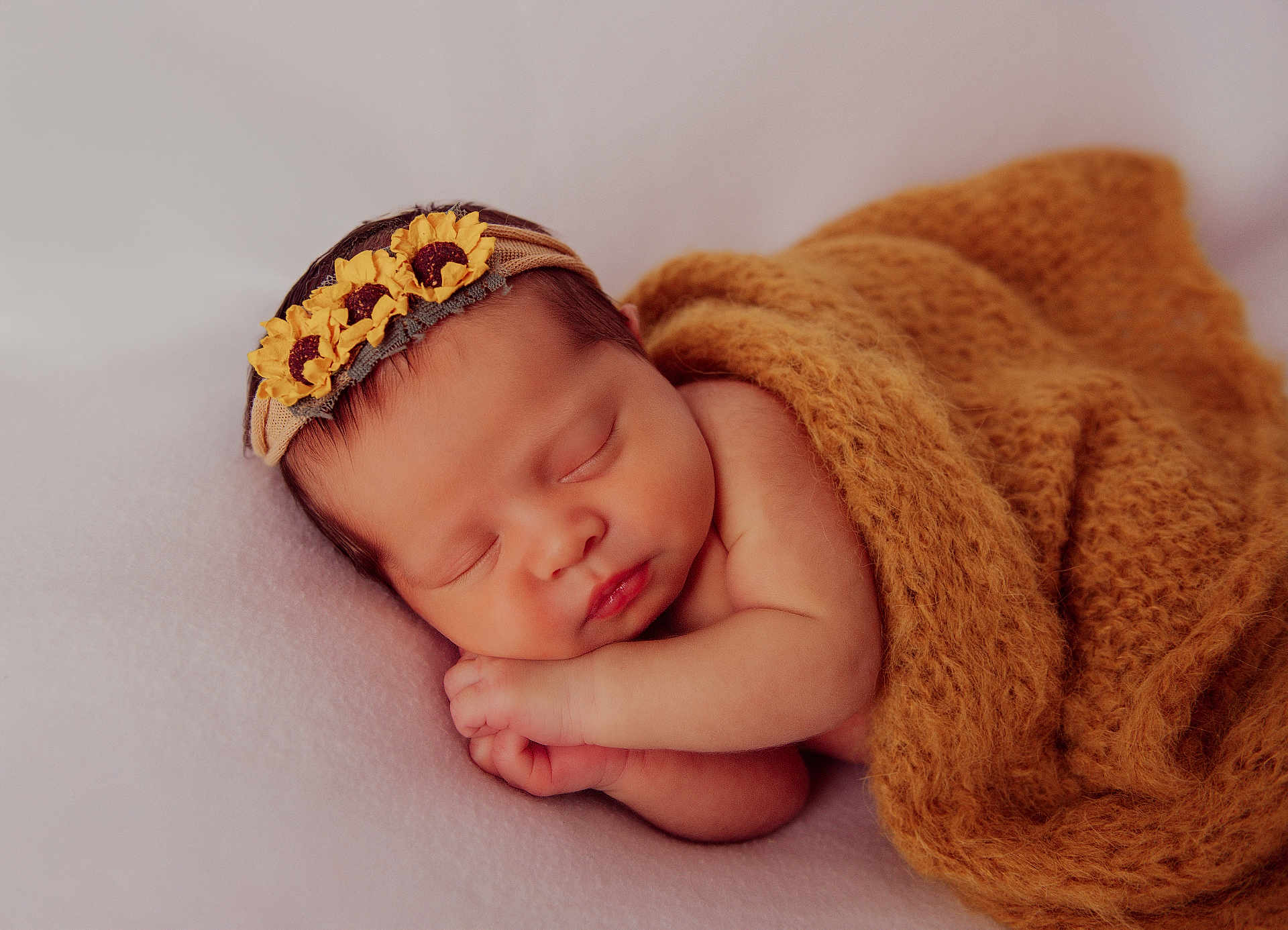 Aurora joined the competition — help win amazing prizes! baby, sleeping, newborn, blanket, headband, flower, sunflower, cozy, cute, infant, peaceful, soft, wrapped, portrait, hands, face, skin, resting, child, warm