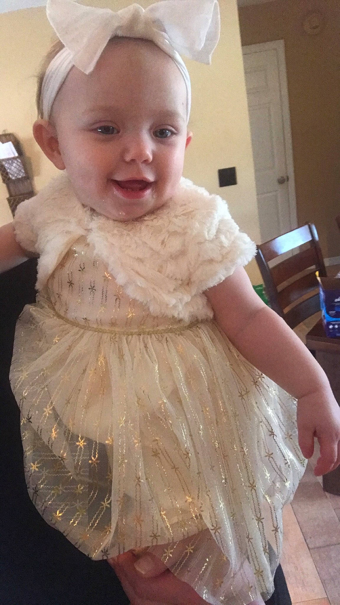 Aliya is registered to the contest to win money with this photo: baby, baby_toddler_clothing, cheek, child, child_model, day_dress, dress, embellishment, hair_accessory, headband, headpiece, iris, one_piece_garment, person, ruffle, skin, toddler