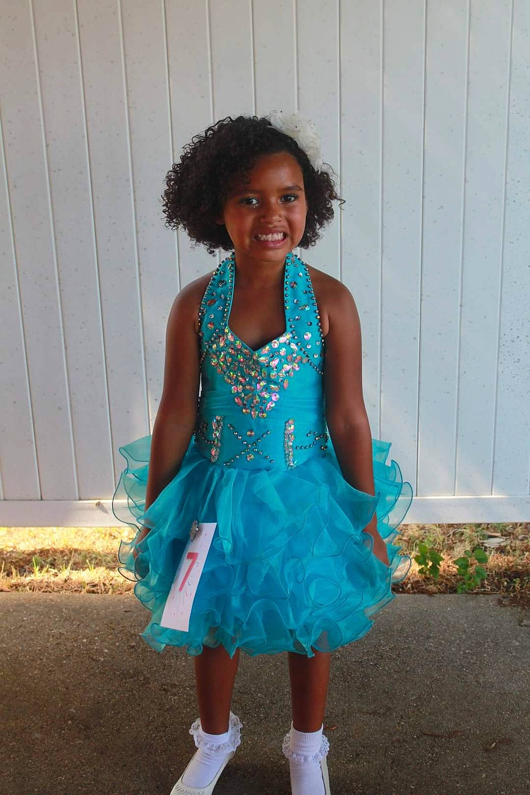 Annsleigh joined the competition — help win amazing prizes! abdomen, child, day_dress, electric_blue, entertainment, event, fashion_accessory, fashion_design, formal_wear, fun, happy, human_leg, jewellery, joy, magenta, necklace, performing_arts, person, ruffle, smile