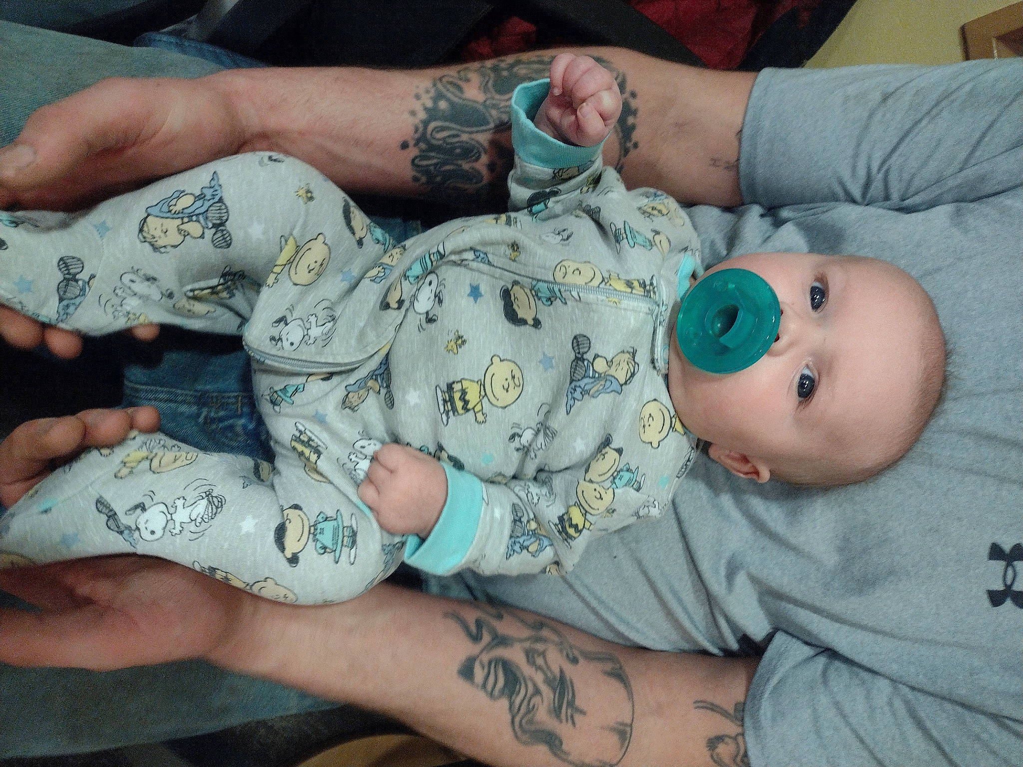 Mikah is registered to the contest to win money with this photo: arm, baby, baby_toddler_clothing, elbow, finger, gesture, hand, health_care, human_leg, joint, knee, medical_procedure, nail, pattern, person, skin, tattoo_artist, temporary_tattoo, thumb, toddler