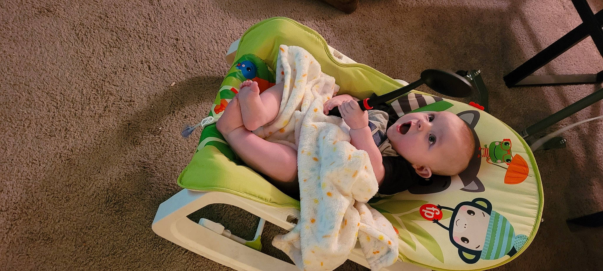 Christopher is registered to the contest to win money with this photo: baby, baby_products, baby_toddler_clothing, baby_toys, child, comfort, fun, grass, leisure, person, plastic, play, recreation, room, sitting, surprise, textile, thigh, toddler, toy