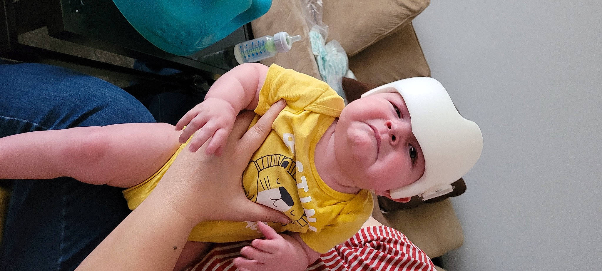 Christopher is registered to the contest to win money with this photo: baby, baby_products, baby_toddler_clothing, elbow, finger, fun, gesture, happy, headwear, human_leg, joint, knee, mouth, nail, person, sitting, skin, thigh, thumb, toddler