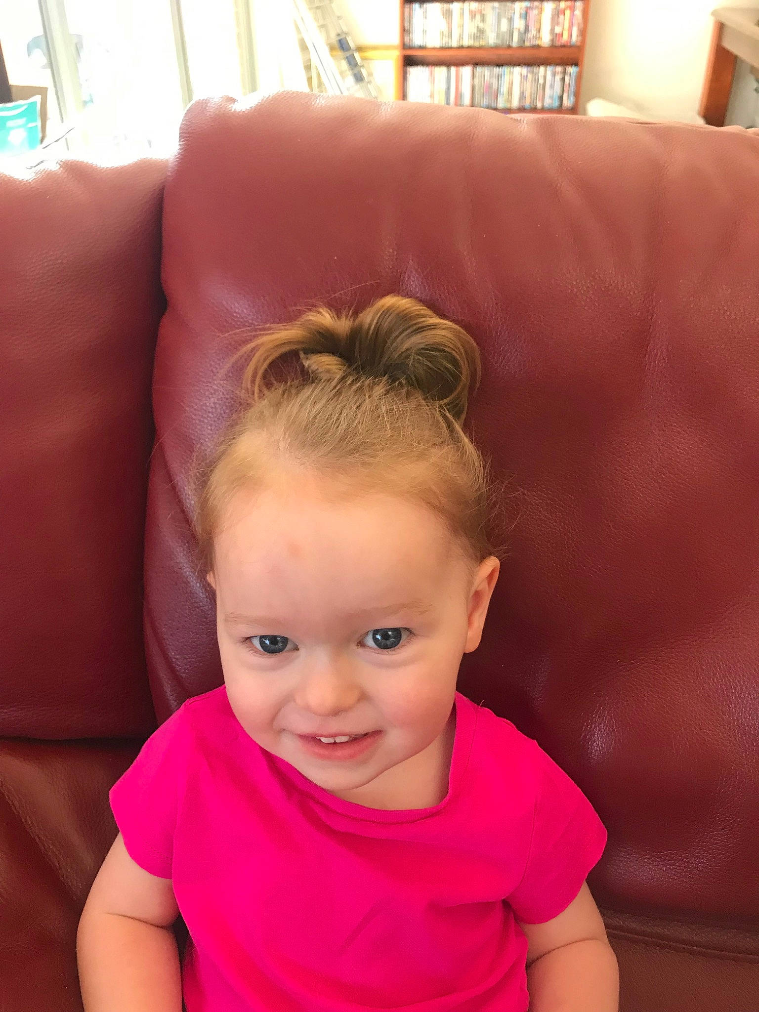 Scarlett is registered to the contest to win money with this photo: arm, cheek, child, chin, ear, face, forehead, hair, hairstyle, head, joy, lip, mouth, neck, person, pink, skin, smile, throat, toddler