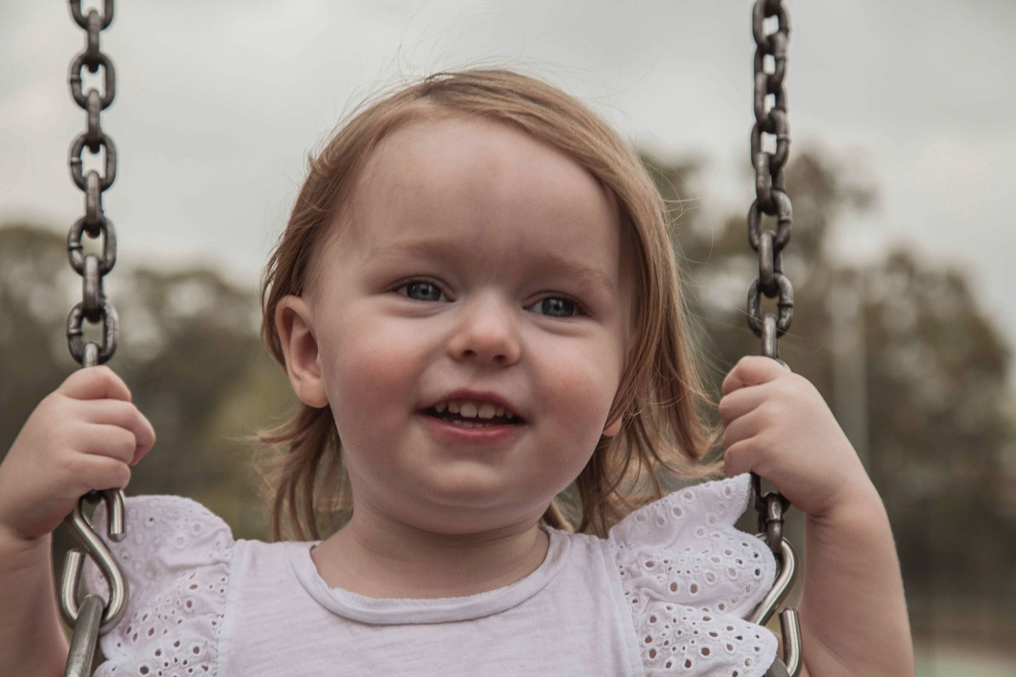 Scarlett joined the competition — help win amazing prizes! child, child_model, facial_expression, fun, happy, joy, outdoor_play_equipment, person, photography, portrait_photography, smile, swing, toddler