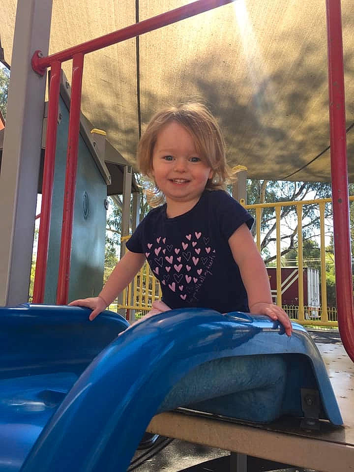 Scarlett joined the competition — help win amazing prizes! amusement_park, amusement_ride, child, fun, happy, joy, leisure, outdoor_play_equipment, park, person, play, playground, playground_slide, public_space, recreation, sitting, smile, toddler, vacation