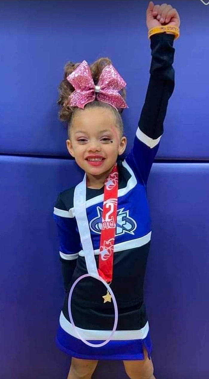 Samiyah joined the competition — help win amazing prizes! child, costume, costume_hat, electric_blue, entertainment, event, face, fashion_accessory, fashion_design, gesture, happy, headband, headpiece, jewellery, joy, performing_arts, person, sleeve, smile, sportswear