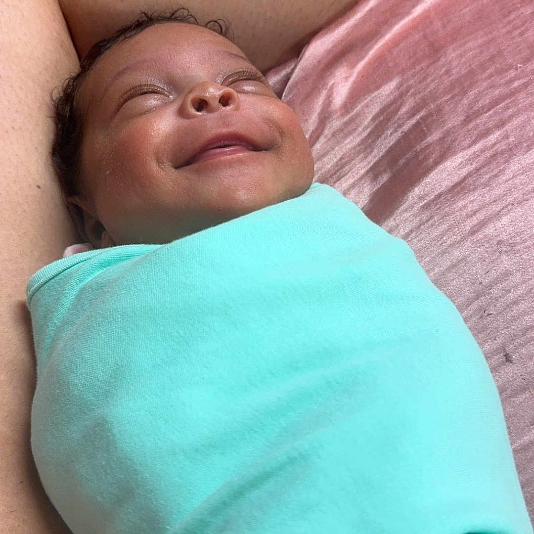 Janelle is registered to the contest to win money with this photo: architecture, baby, bed, bedroom, blanket, building, cushion, face, furniture, head, homedecor, hospital, indoors, newborn, person, photography, portrait, quilt, room, sleeping