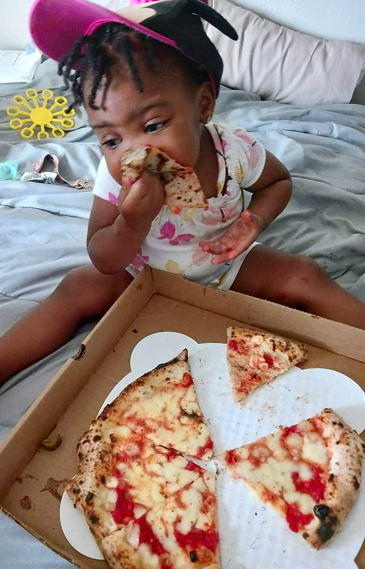 My'Ari joined the competition — help win amazing prizes! california_style_pizza, cheese, child, comfort_food, cuisine, dish, event, fast_food, food, hat, ingredient, junk_food, person, pizza, pizza_cheese, produce, recipe, sharing, staple_food, tableware