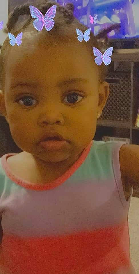 My'Ari is registered to the contest to win money with this photo: active_tank, baby, baby_toddler_clothing, blue, cheek, chin, ear, eyelash, facial_expression, forehead, happy, iris, lip, mouth, neck, nose, organ, person, pink, skin