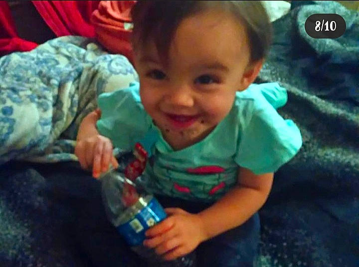 Harley is registered to the contest to win money with this photo: adaptation, bottle, cheek, cool, drinking_water, drinkware, finger, hand, happy, iris, joy, mammal, mouth, nose, person, photograph, plastic_bottle, skin, smile, toddler