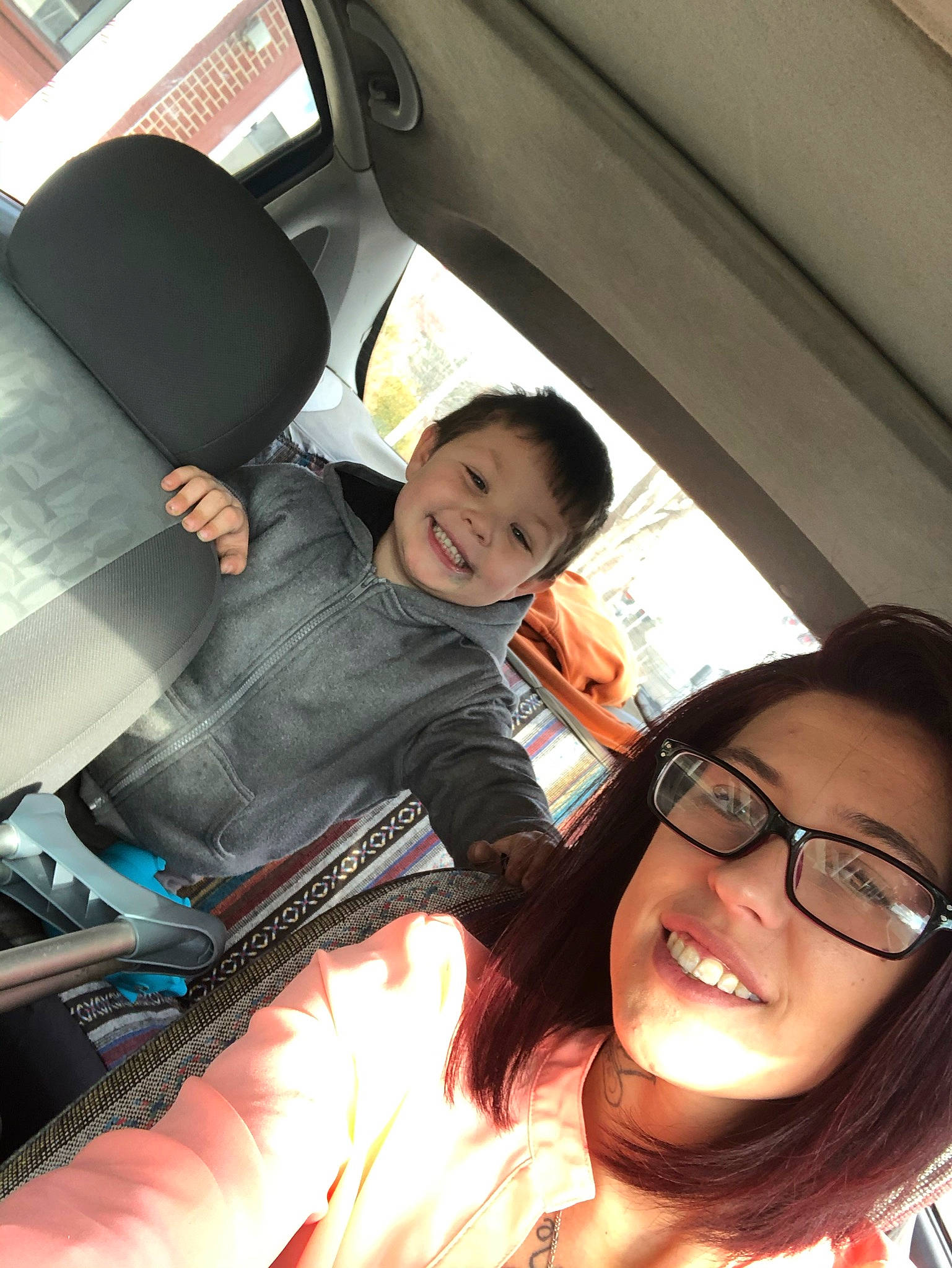 Bryson is registered to the contest to win money with this photo: automotive_design, automotive_exterior, car, car_seat, car_seat_cover, comfort, cool, eyewear, fun, glasses, happy, head_restraint, joy, motor_vehicle, person, personal_luxury_car, smile, steering_wheel, travel, vehicle
