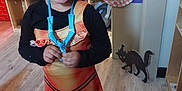 Venyce is registered to the contest to win money with this photo: accessories, bag, boy, child, clothing, costume, dress, face, footwear, handbag, head, indoors, male, person, photography, plywood, portrait, shelf, shoe, wood