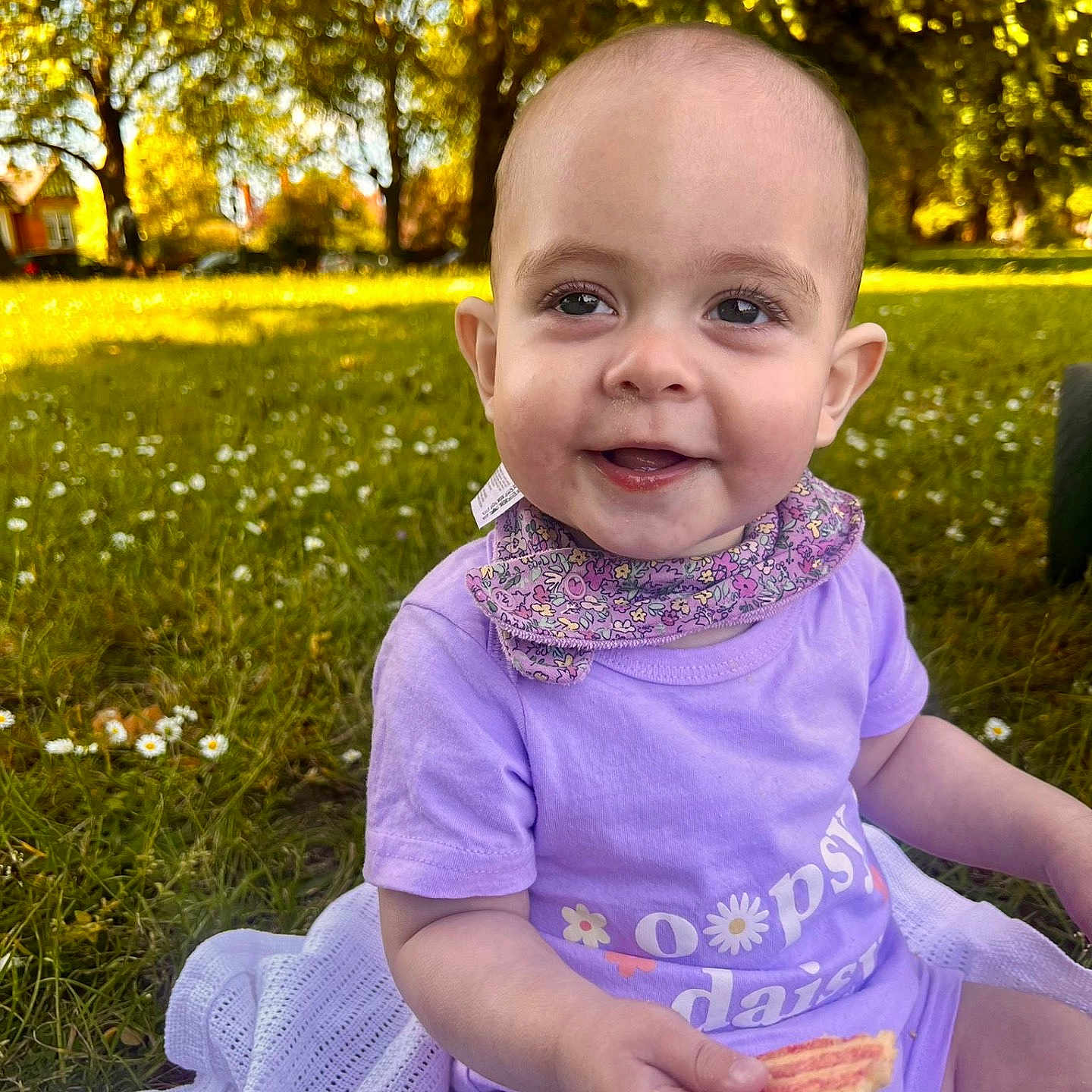 Lilith joined the competition — help win amazing prizes! baby, backyard, bread, clothing, face, food, grass, happy, head, lawn, nature, outdoors, park, person, photography, plant, portrait, sitting, tree, yard