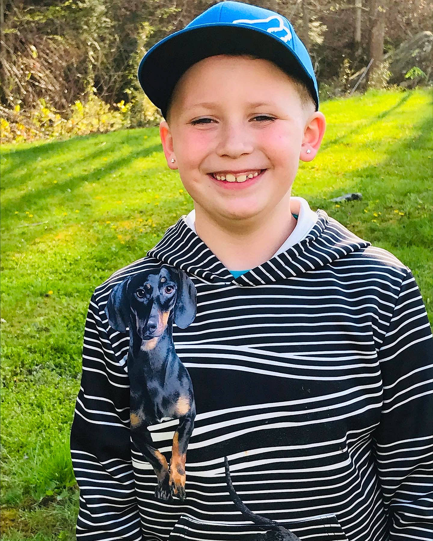 Cree joined the competition — help win amazing prizes! baseball_cap, blue, cap, carnivore, child, electric_blue, fashion_accessory, fun, grass, green, guard_dog, happy, headwear, joy, laugh, pattern, people_in_nature, person, sleeve, smile