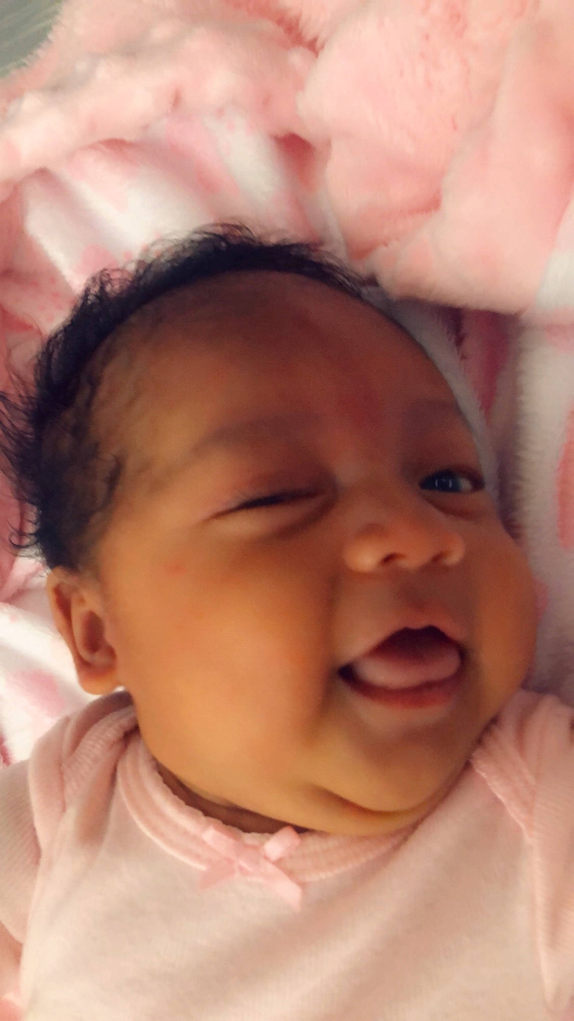 Jaquelín is registered to the contest to win money with this photo: baby, baby_making_funny_faces, cheek, child, chin, close_up, eye, eyebrow, face, facial_expression, forehead, happy, head, lip, mouth, nose, person, pink, skin, smile