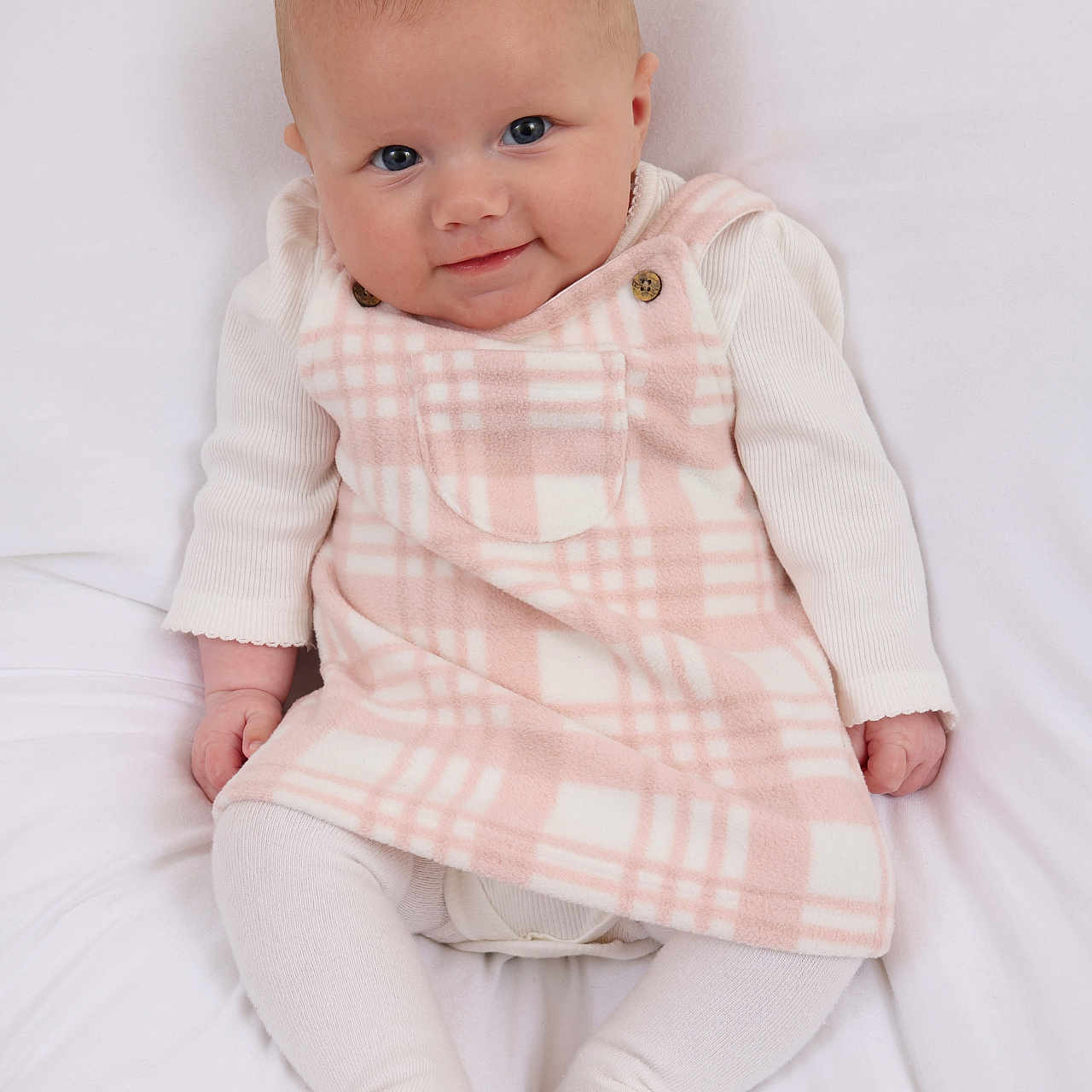 Paige is registered to the contest to win money with this photo: baby, blanket, bodypart, clothing, face, finger, hand, head, homedecor, hosiery, linen, longsleeve, newborn, pants, person, photography, portrait, sitting, sleeve, sock