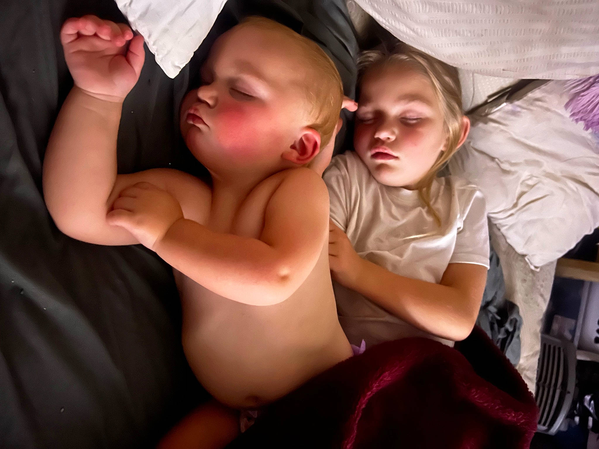 Madison joined the competition — help win amazing prizes! abdomen, baby, barechested, chest, child, comfort, elbow, event, flash_photography, flesh, fun, gesture, happy, human_leg, muscle, person, sitting, thigh, toddler, tree