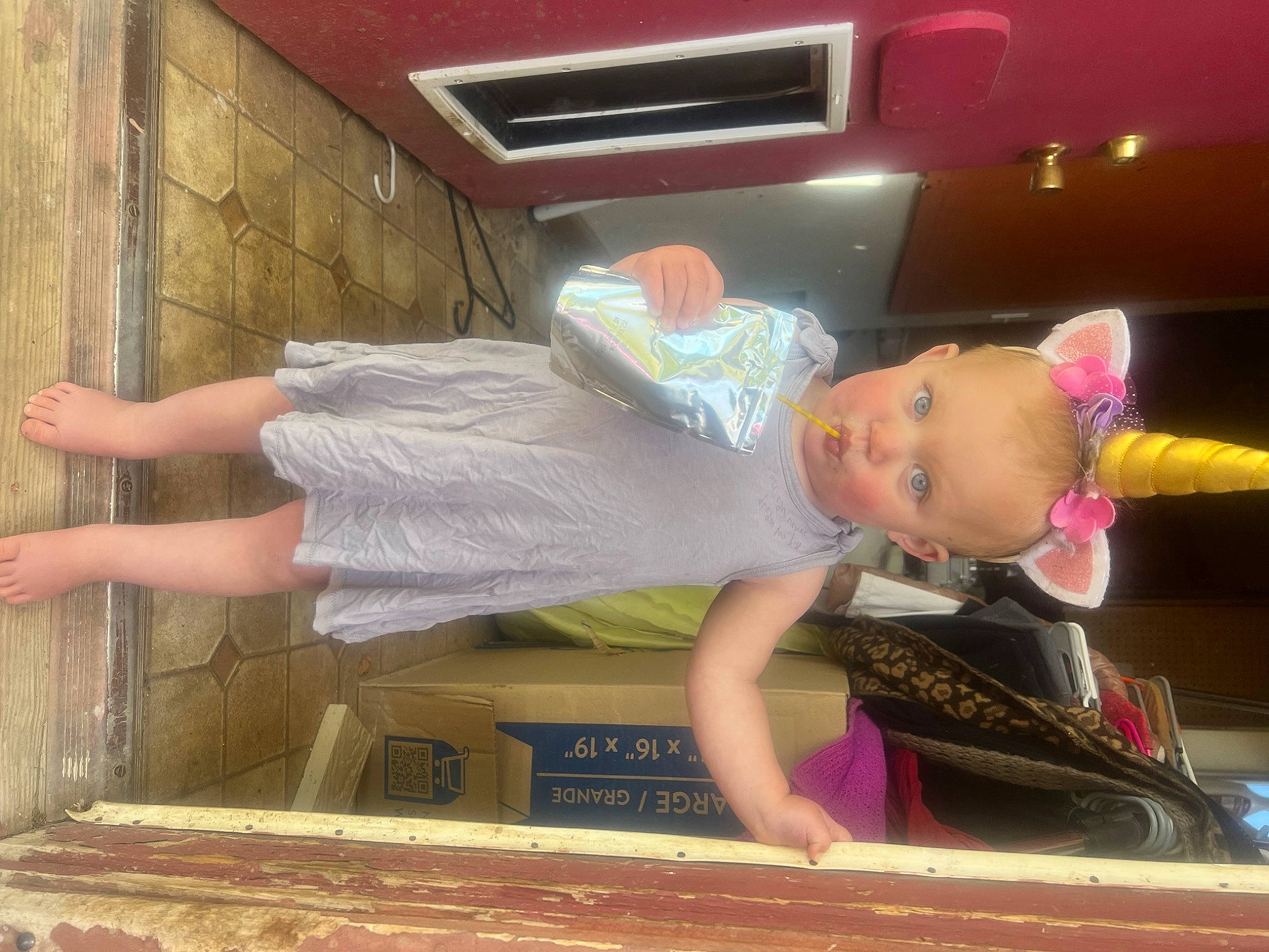 Madison joined the competition — help win amazing prizes! baby, baby_toddler_clothing, child, drawer, fun, hat, human_leg, magenta, person, room, t_shirt, thigh, toddler, toy, vacation, wood