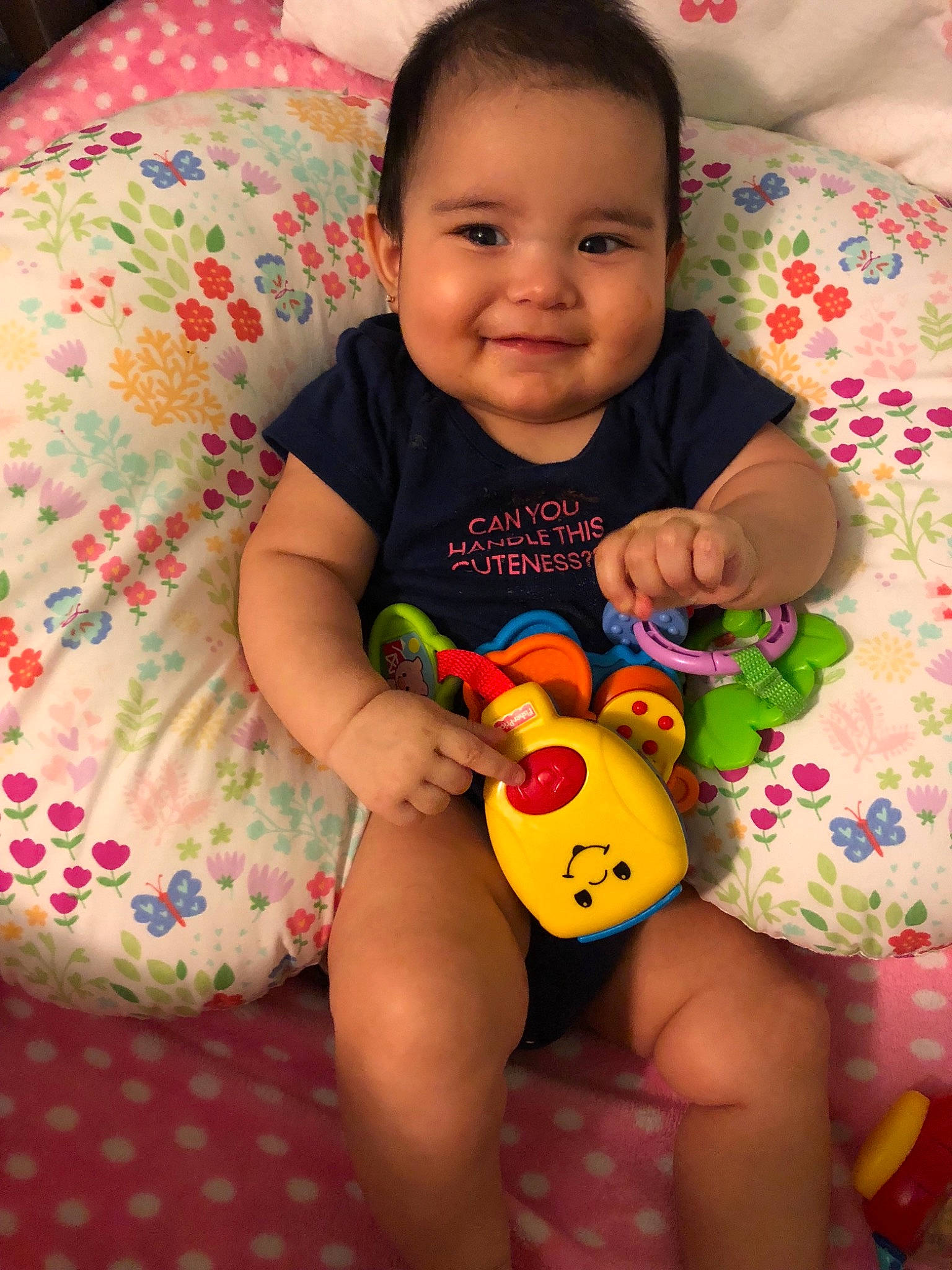 Leilah is registered to the contest to win money with this photo: baby, baby_products, baby_toddler_clothing, baby_toys, cheek, child, finger, head, joy, lip, musical_instrument, neck, person, play, product, skin, toddler, toy
