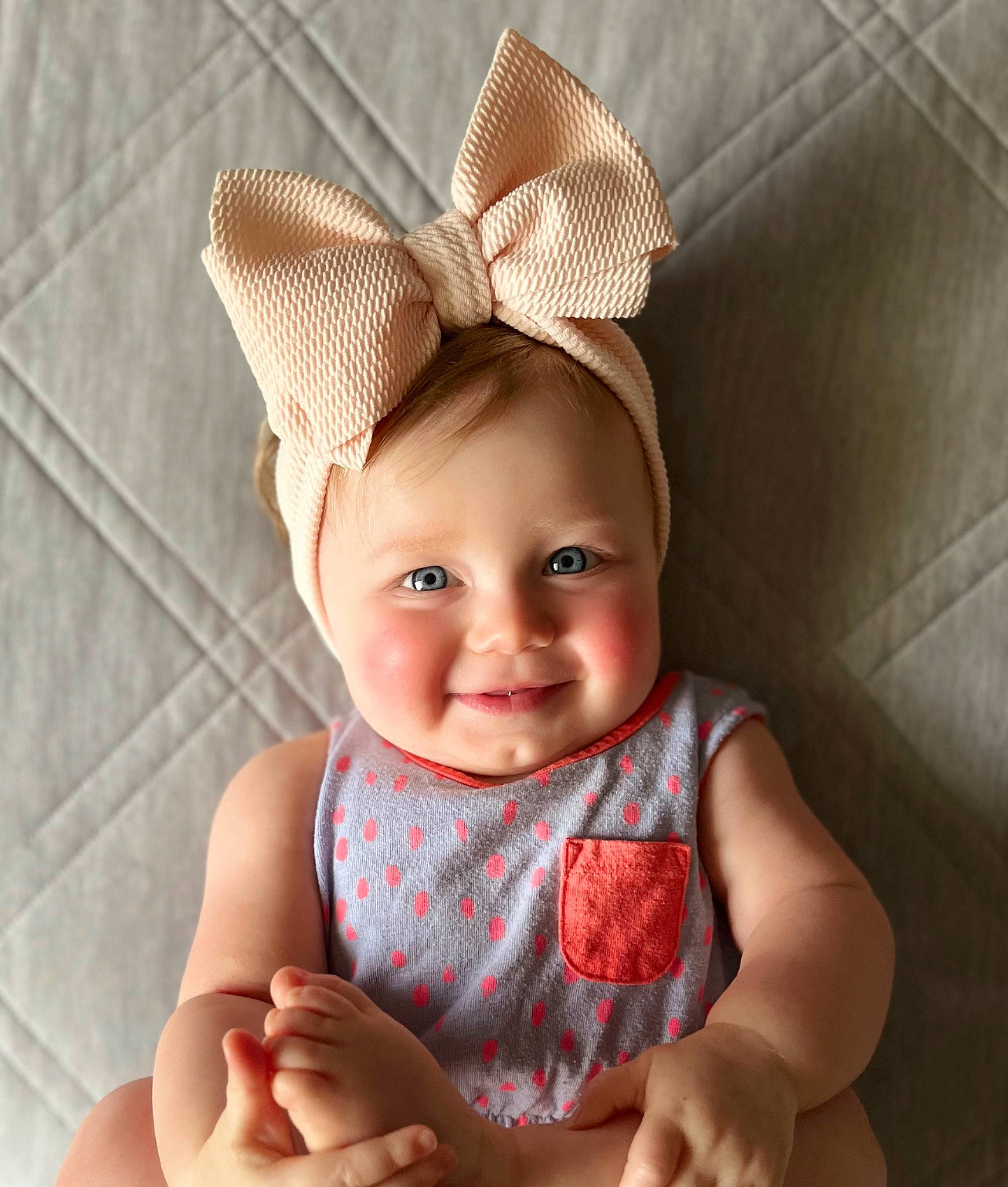 Haisley joined the competition — help win amazing prizes! baby, baby_toddler_clothing, cap, chin, costume_hat, eye, eyebrow, face, finger, gesture, happy, hat, head, joy, lip, person, pink, product, skin, sleeve