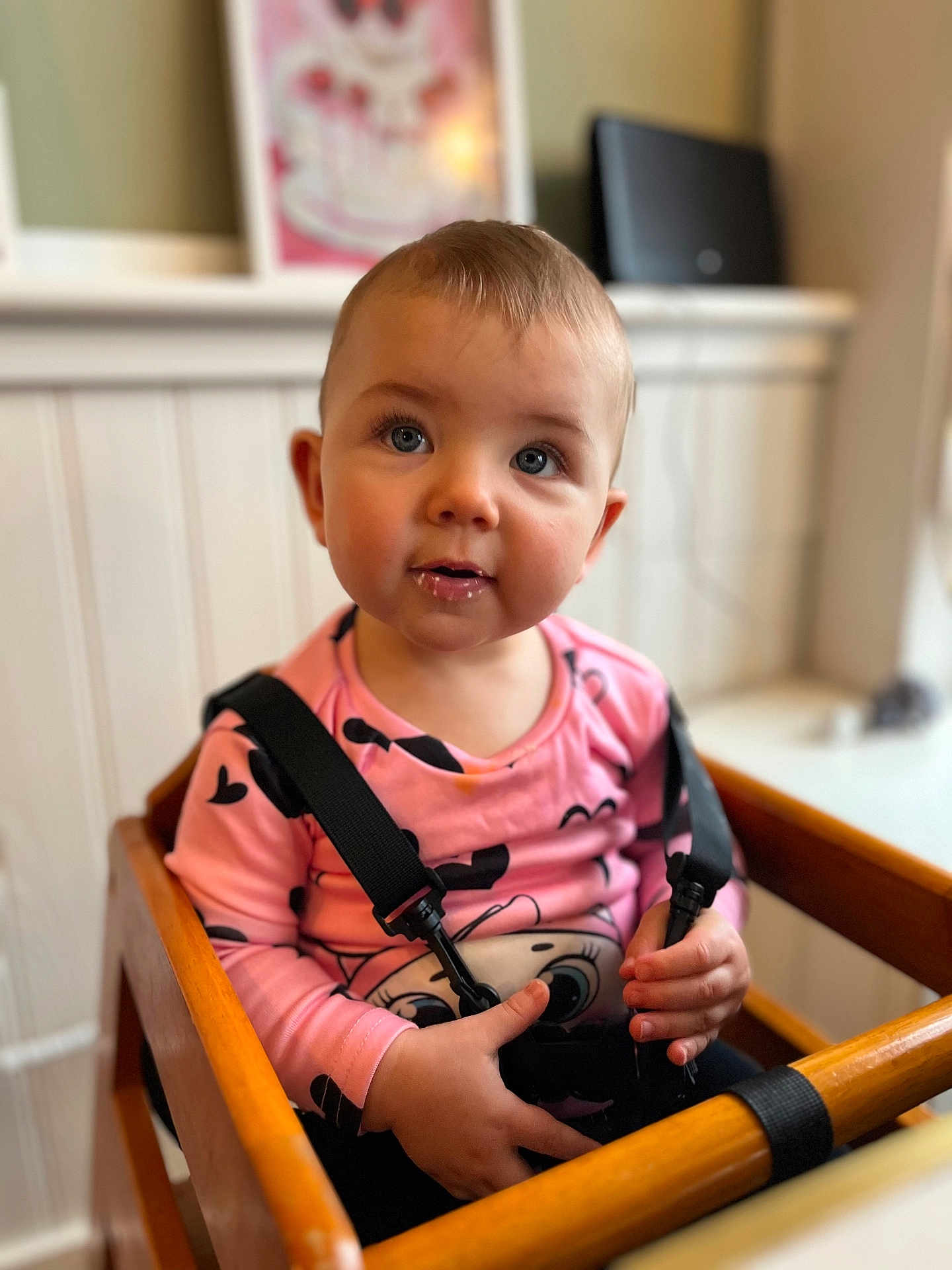 Maddison joined the competition — help win amazing prizes! toddler, child, baby, high_chair, pink_shirt, suspenders, blue_eyes, indoor, wooden_furniture, curious_expression, drool, person, portrait, casual_clothing, cute, young_child, face, hands, seated, cozy