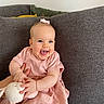 Magdalena participe au concours pour gagner de l'argent avec cette photo : baby, blue_eyes, bow, bunny, child, couch, cute, girl, gray_couch, green_pillow, hands, happy, indoor, laughing, pillow, pink_dress, plush_toy, seated, smile, yellow_pillow