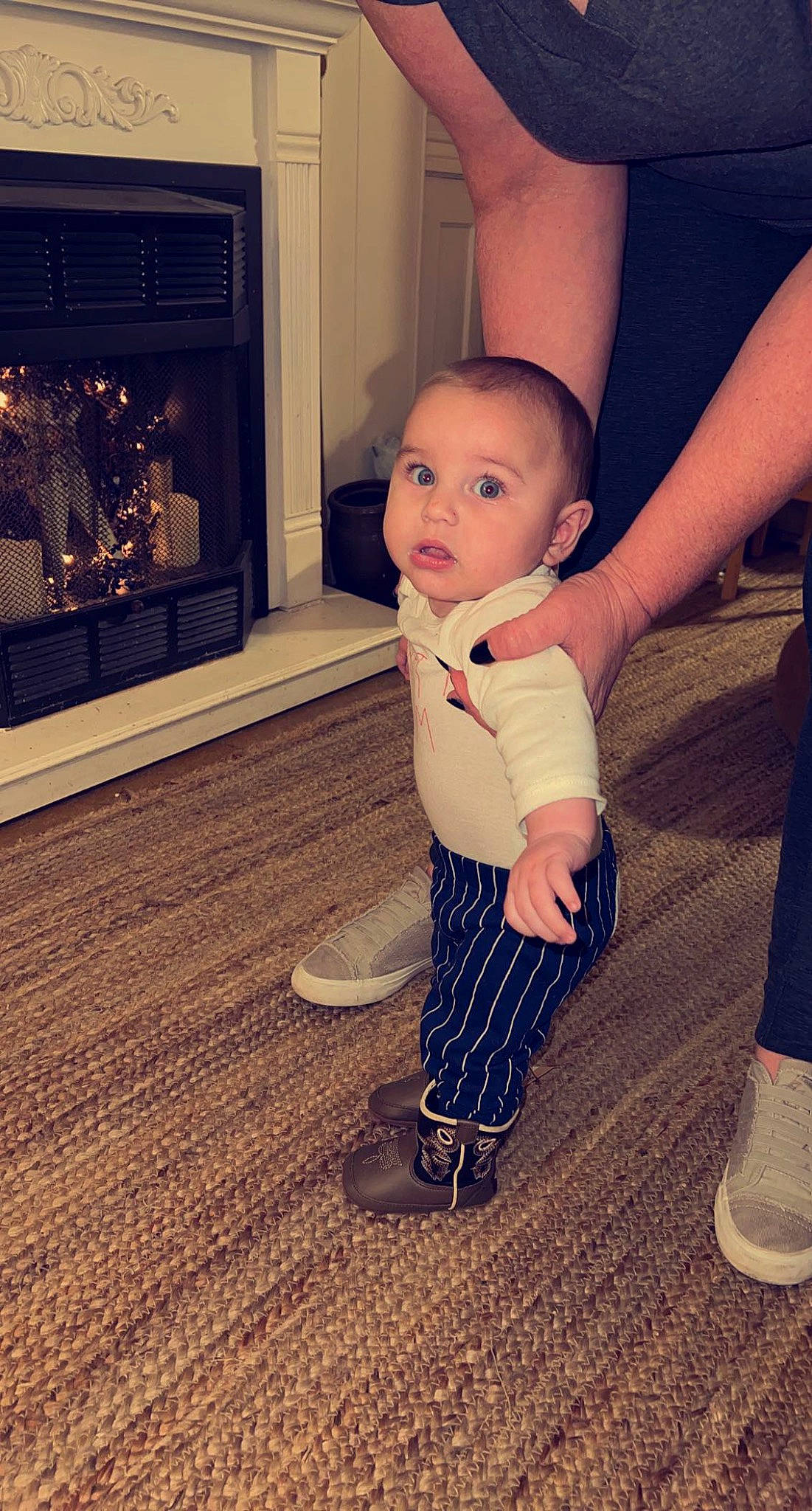 Brantley joined the competition — help win amazing prizes! baby, baby_toddler_clothing, child, cool, eye, floor, flooring, foot, fun, gesture, happy, hardwood, human_leg, person, play, shoe, sitting, sleeve, surprise, toddler