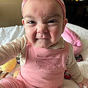 Hazel joined the competition — help win amazing prizes! accessories, baby, bodypart, clothing, couch, cushion, face, finger, furniture, hand, happy, head, headband, homedecor, indoors, person, photography, portrait, smile, t_shirt