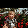 Denver joined the competition — help win amazing prizes! toddler, child, smiling, flowers, red_flowers, pink_flowers, garden, wooden_bench, greenery, sunlight, happy, cute, portrait, short_sleeve_shirt, barefoot, nature, outdoor, plants, blond_hair, baby