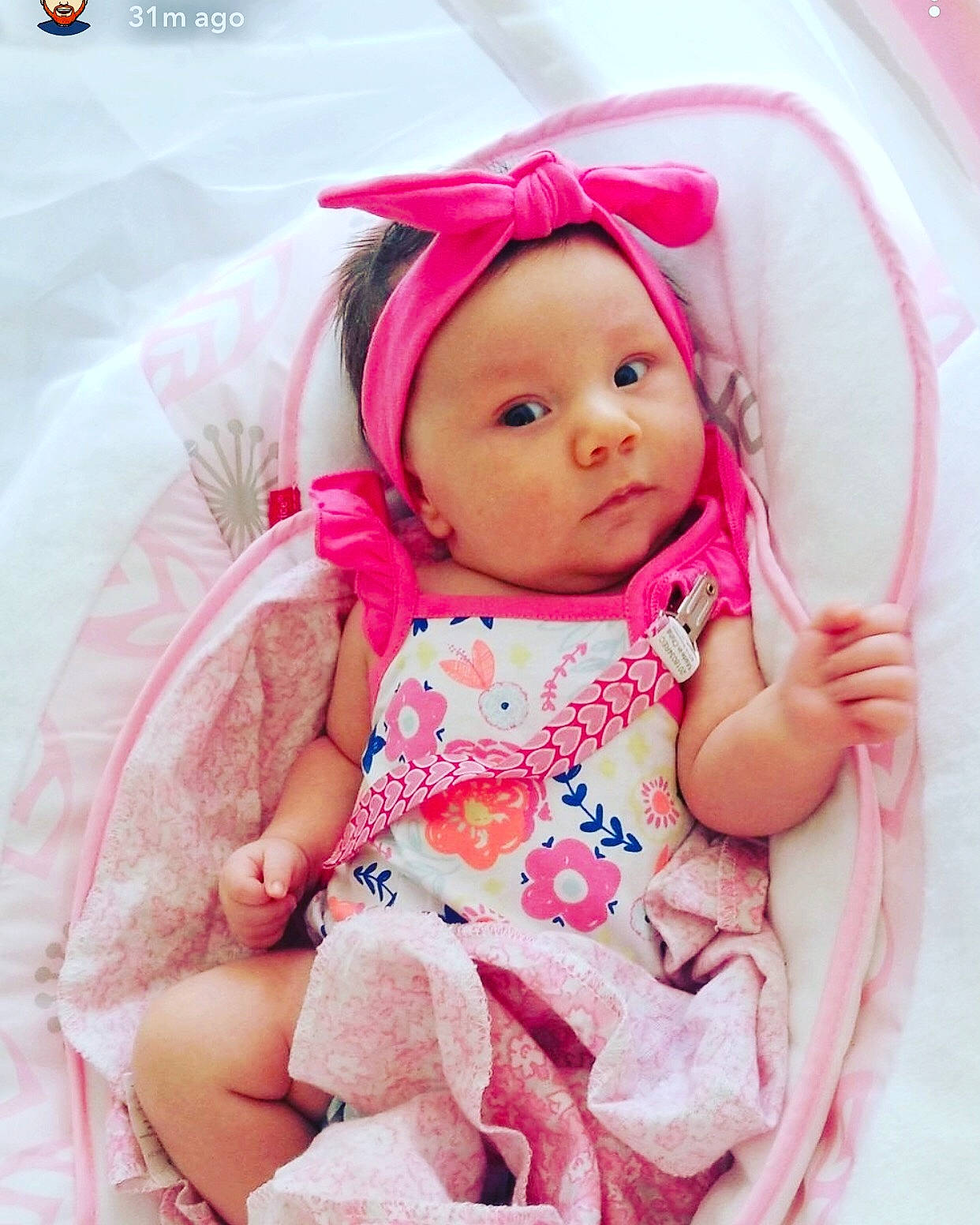 Riverlyn is registered to the contest to win money with this photo: baby, baby_products, cheek, child, head, headgear, outerwear, person, pink, product, skin, smile, toddler